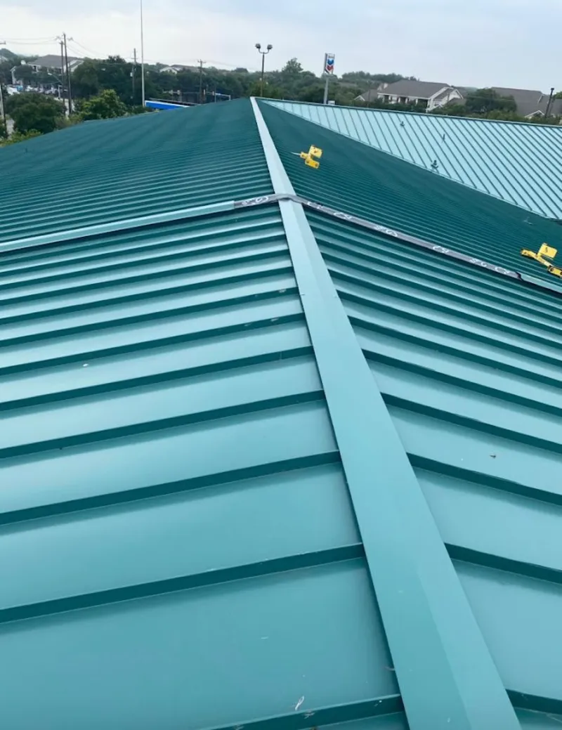 Green commercial metal roof ridge and valley for Metal Roof Repair in Pontoon Beach